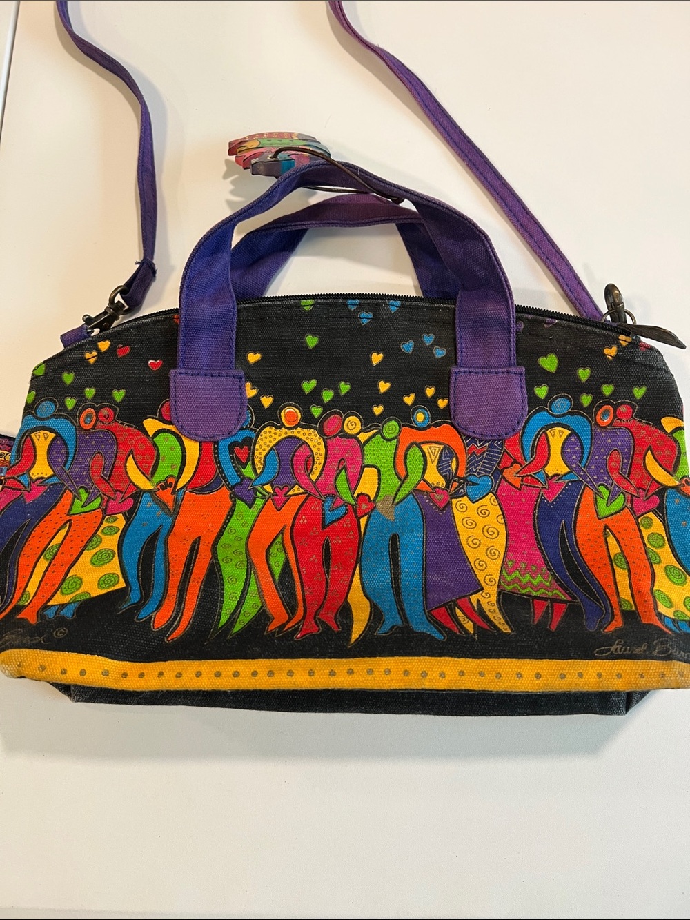 Laurel Burch - 8x13” black canvas purse, colorful people, hearts, fish